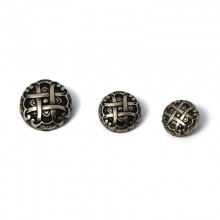 metal button with decorative element